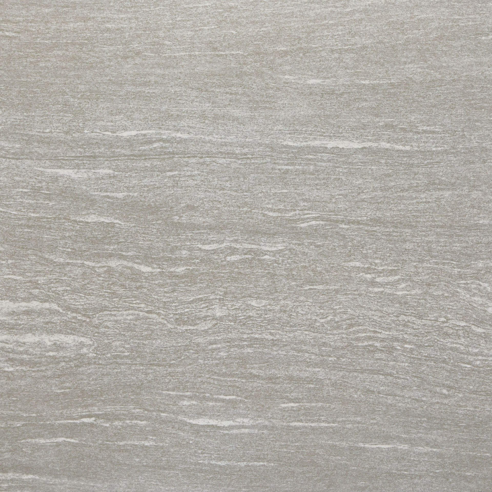 落ち着いた色の大判タイルが清潔感のある美容院